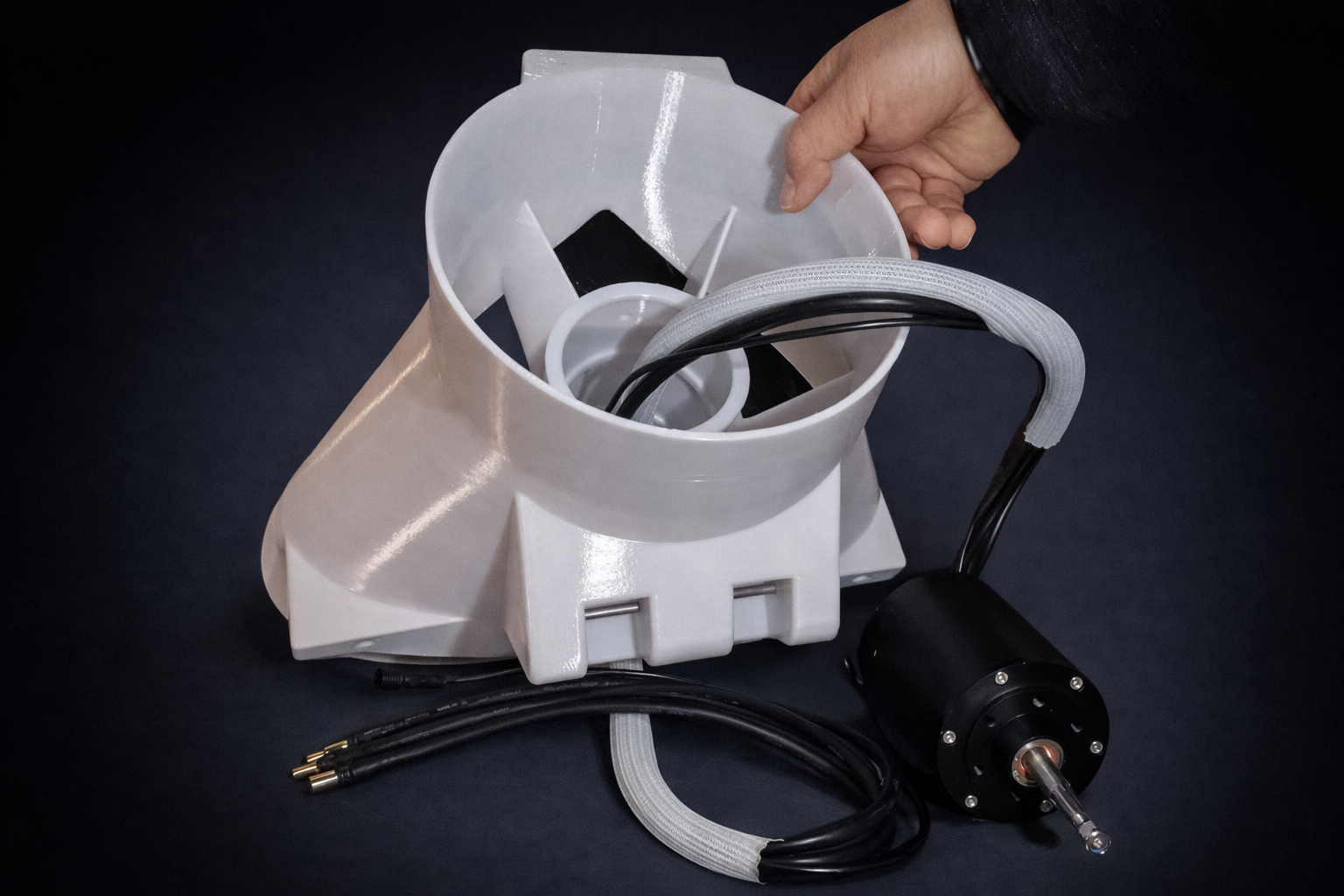 Cable routing ports — sealed wiring feed-through